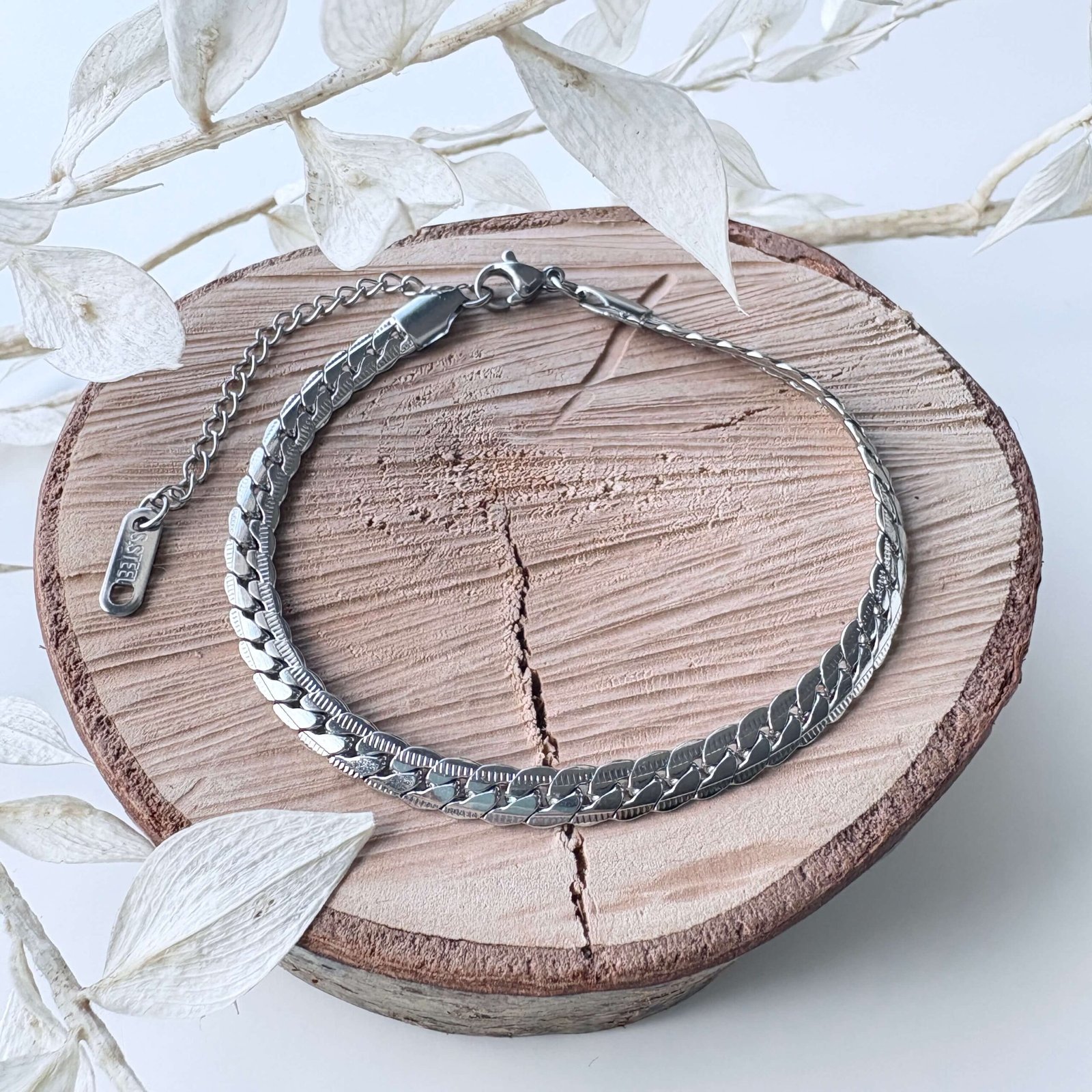 Armband met gevlochten schakelpatroon zilver RVS