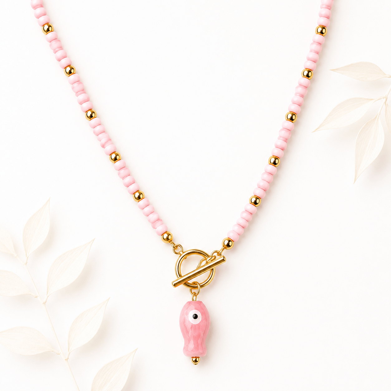 Kralenketting vis mat pastelroze goud