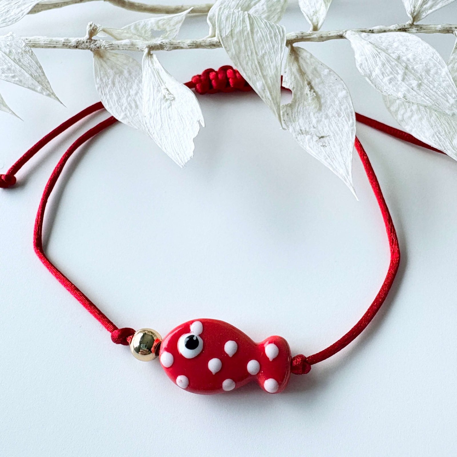 Verstelbare armband vis rood