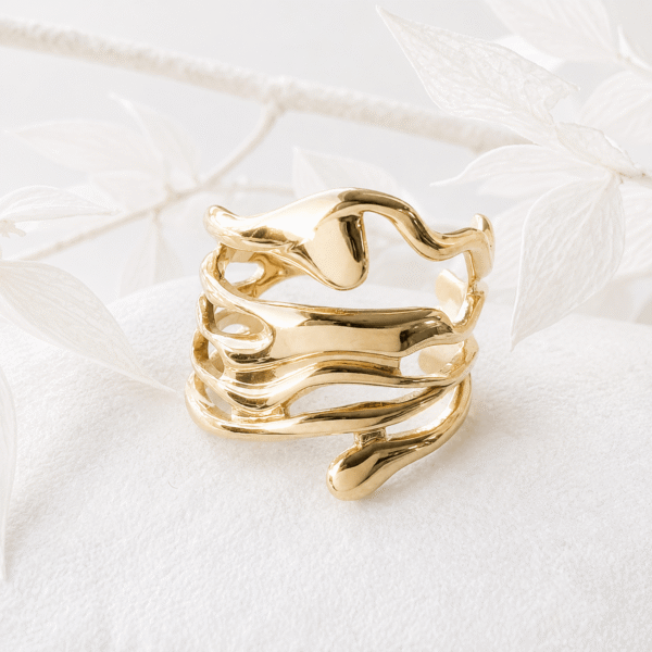 Brede ring wavy goud RVS