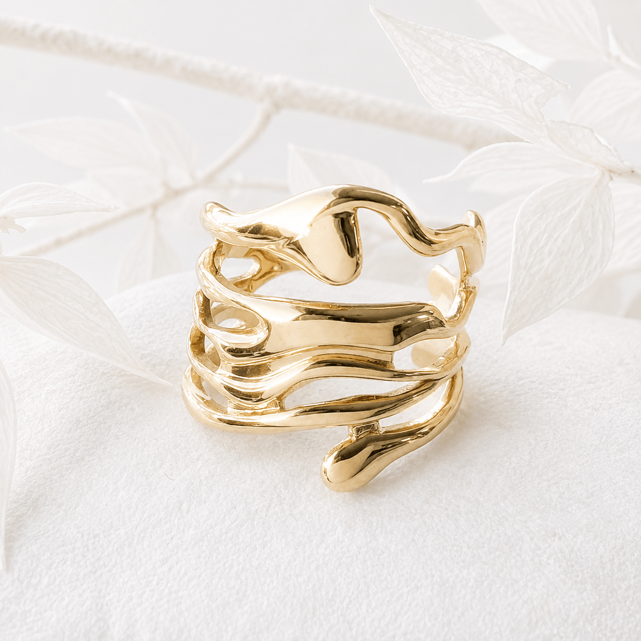 Brede ring wavy goud RVS