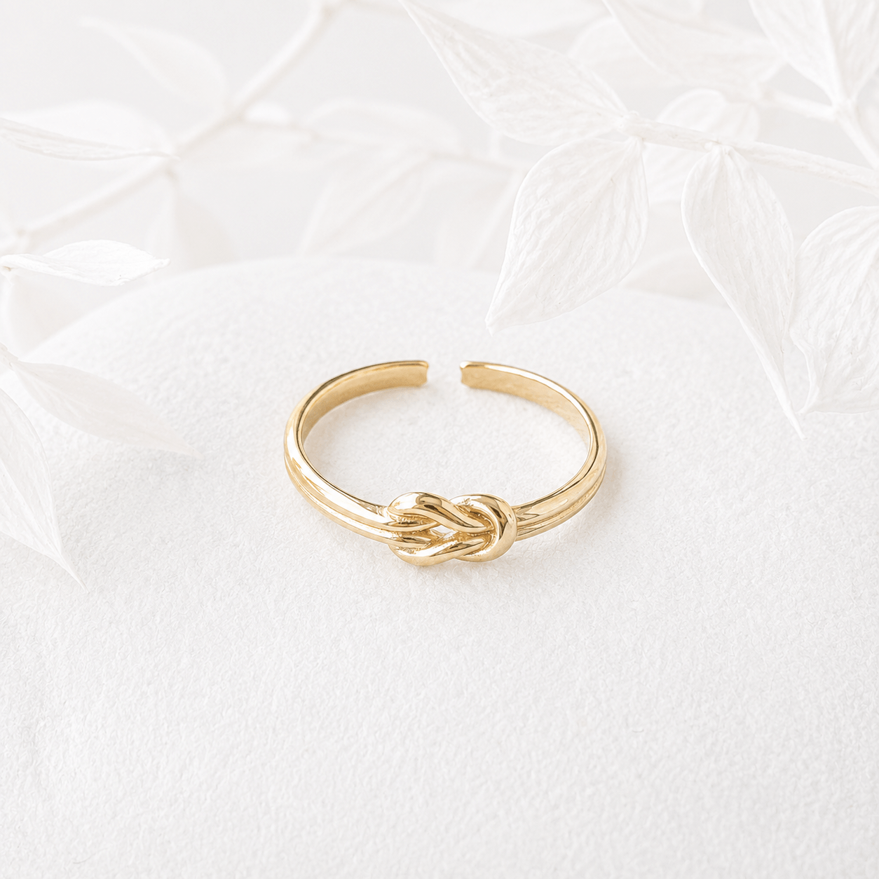 Knoop ring goud RVS
