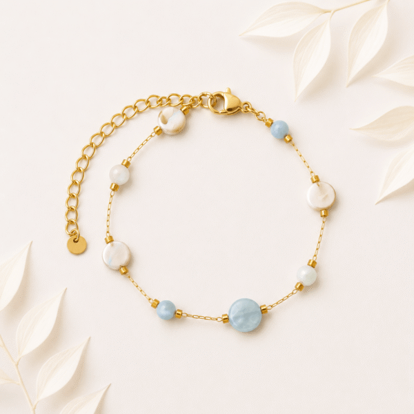 Armband met schelpkralen pastel goud RVS