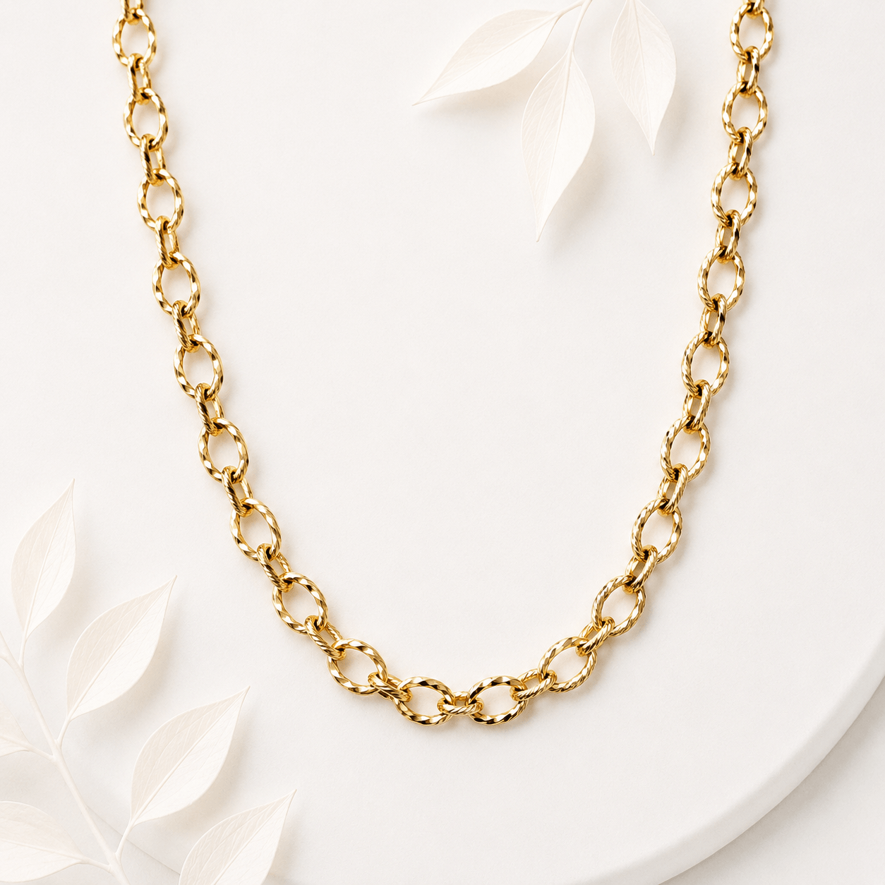 Schakelketting grote ovaal twisted goud RVS