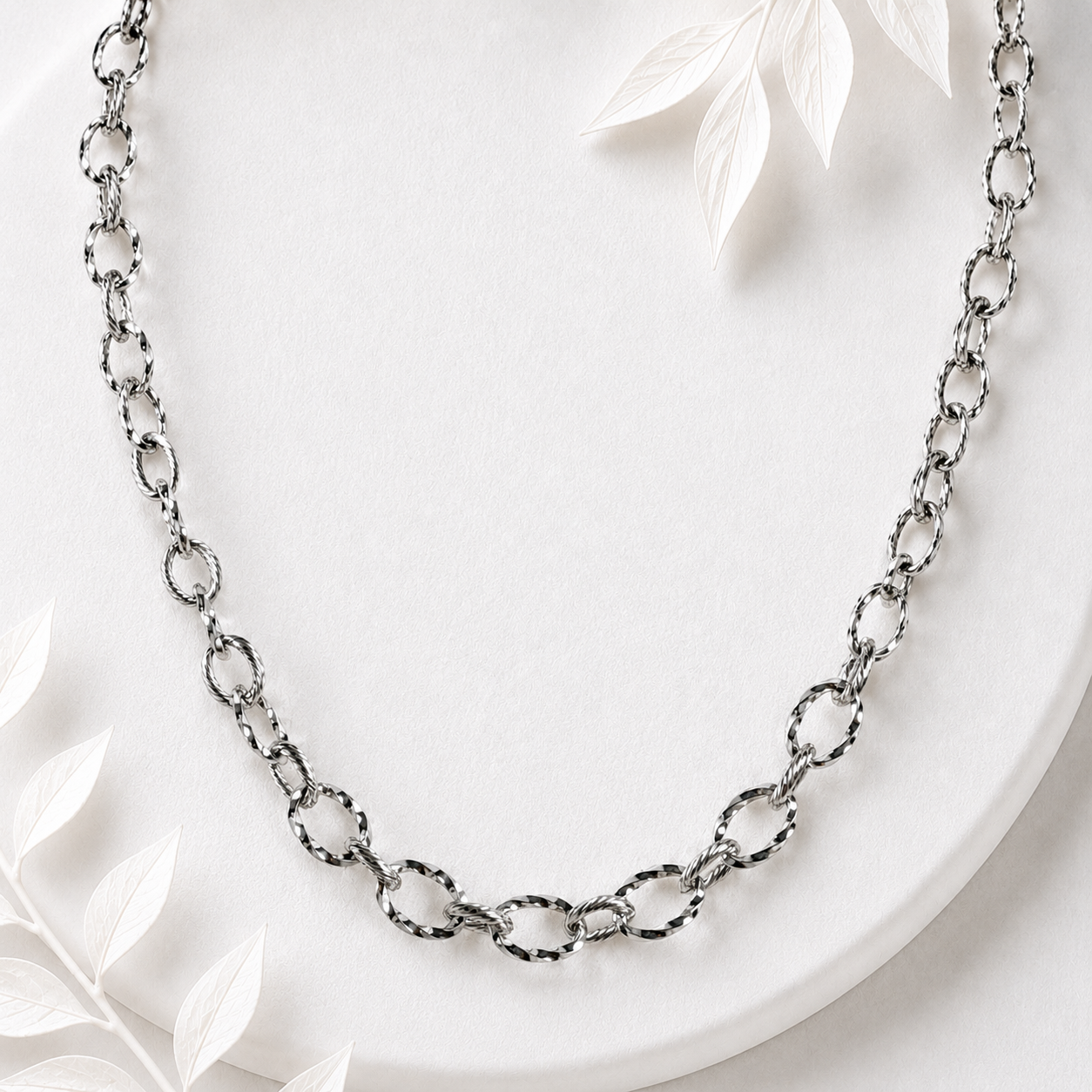 Schakelketting grote ovaal twisted zilver RVS