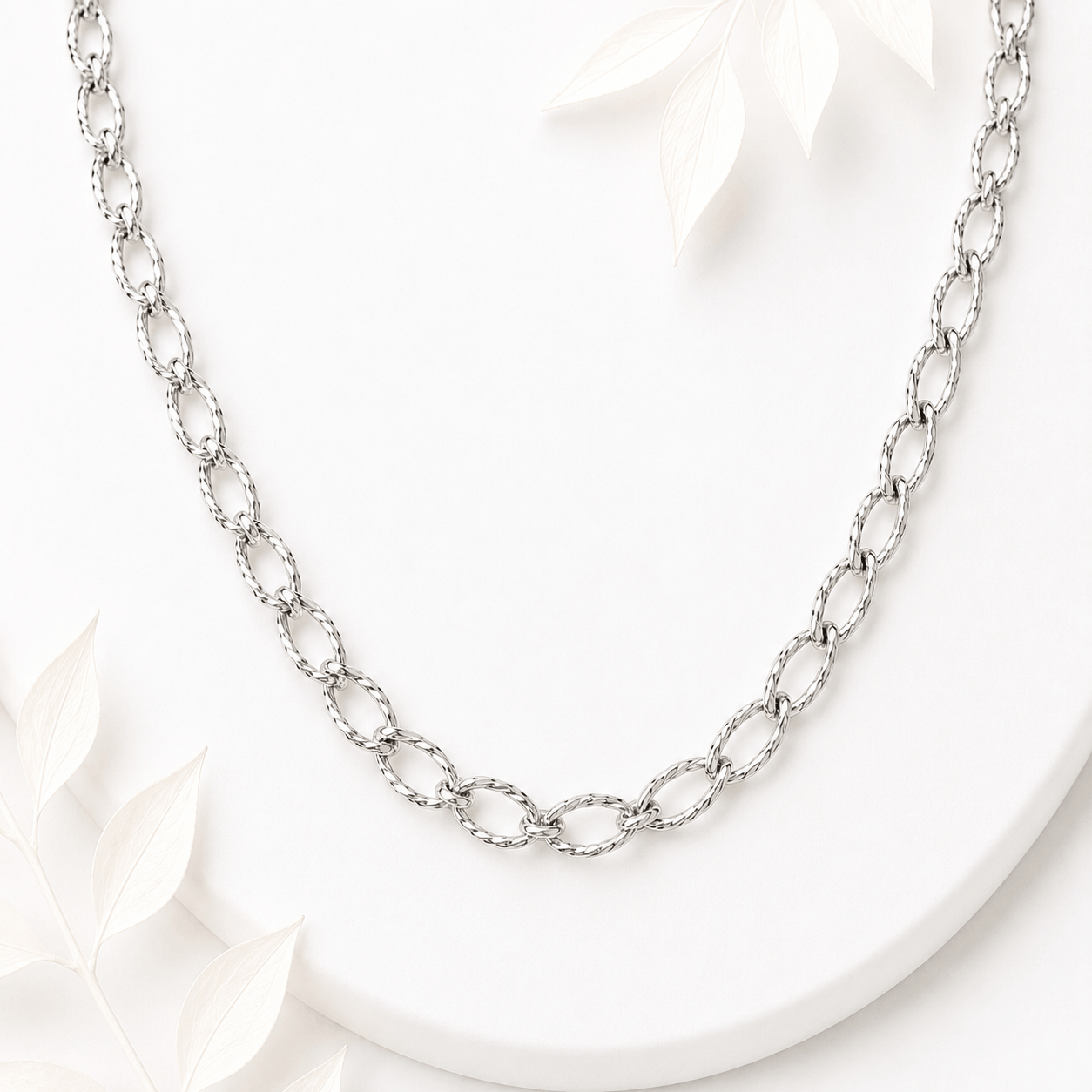 Schakelketting ovaal twisted zilver RVS