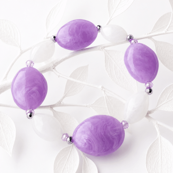 Statement armband pastelpaars wit